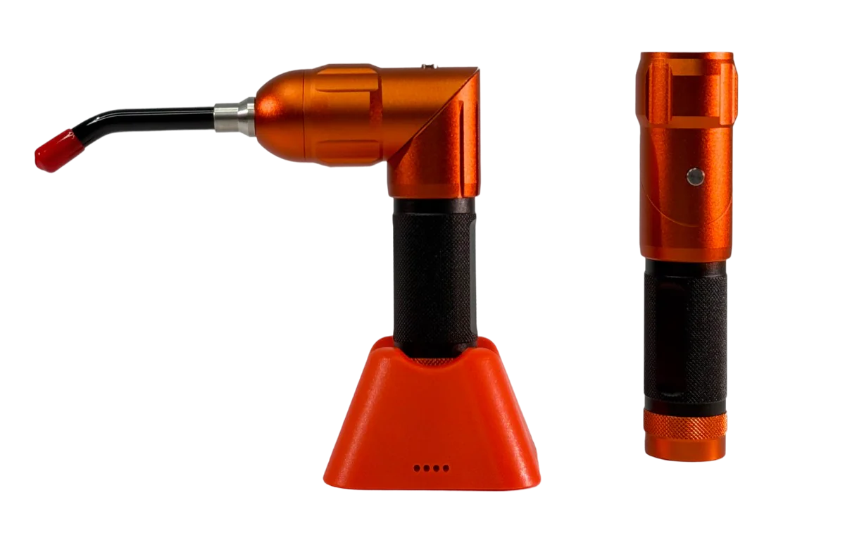 Two orange and black tools on a white background
